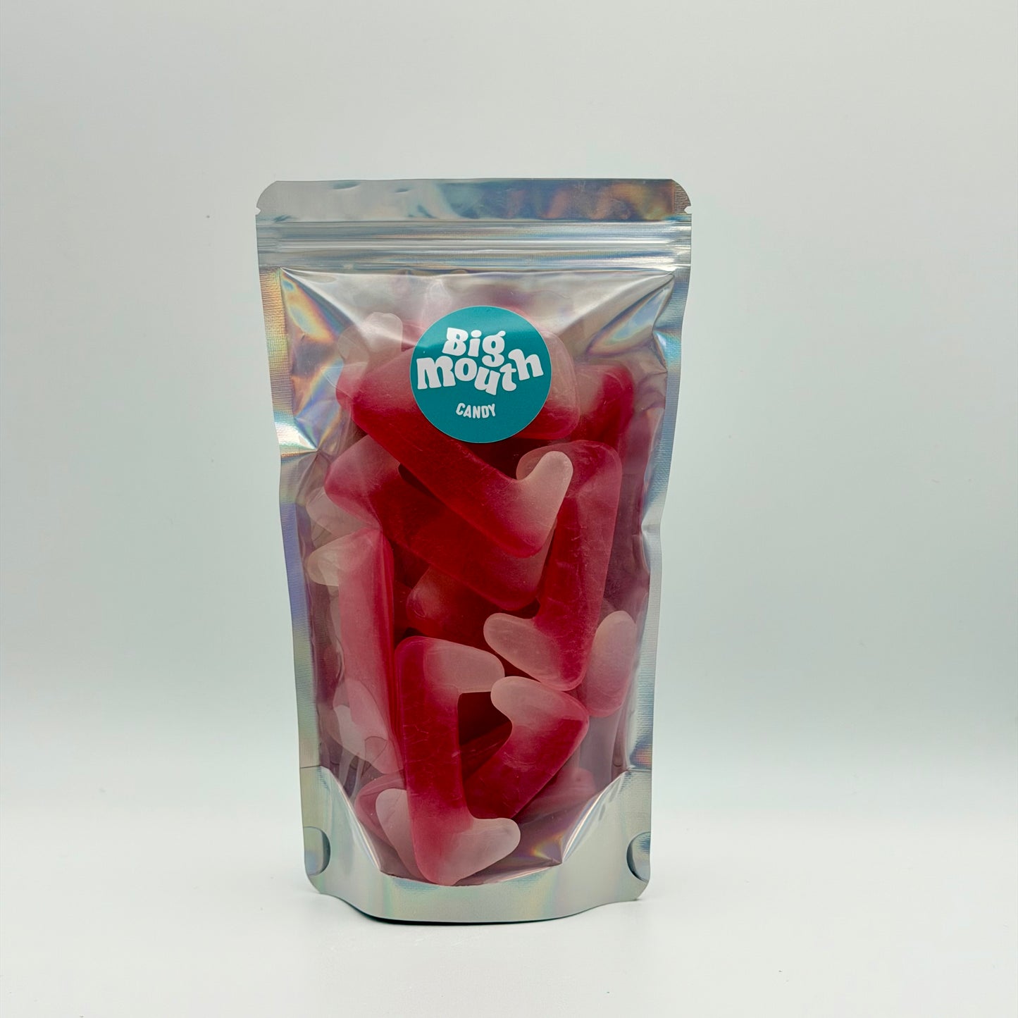 Big Mouth Candy dracula teeth sweets in resealable stand up pouch with holographic bag packaging on white background