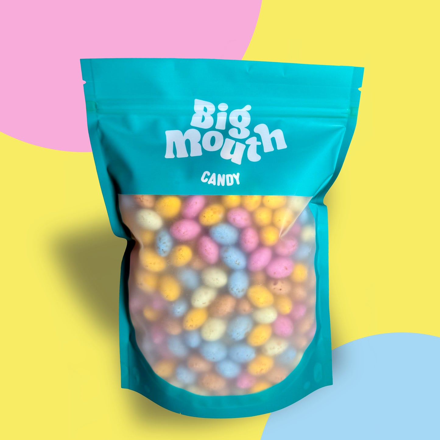 Big Mouth Candy 600g Milk Chocolate Mini Eggs – a delicious pick and mix sweets option for Easter! These chocolate eggs feature a creamy milk chocolate center wrapped in a crunchy pastel-colored shell. Packed in a stylish resealable sweet bag, this pick and mix bag keeps your treats fresh. Perfect for Easter sweets, gifting, or adding to your sweet box. Available for candy delivery across Northern Ireland and the UK