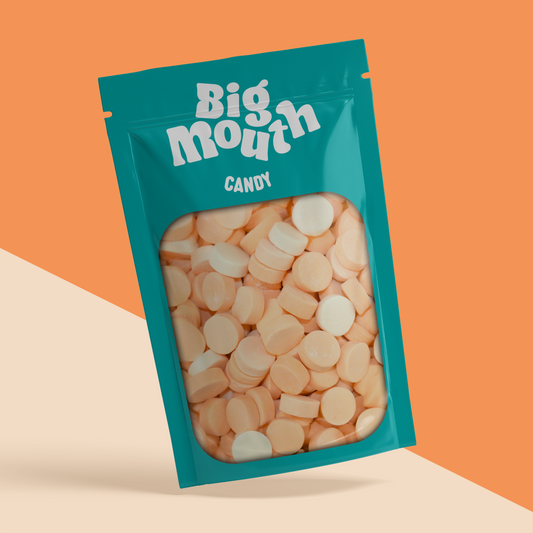 Big Mouth Candy pick and mix bag filled with cinnamon lozenges. The resealable teal pouch features a transparent window showcasing the sweet, fiery treats inside. Perfect for pick and mix sweets, candy lovers, and sweet bags, this vibrant packaging stands out. Ideal for pick and mix UK delivery, sweet box collections, and candy box enthusiasts. Available online for candy delivery across Northern Ireland, including Royal Hillsborough