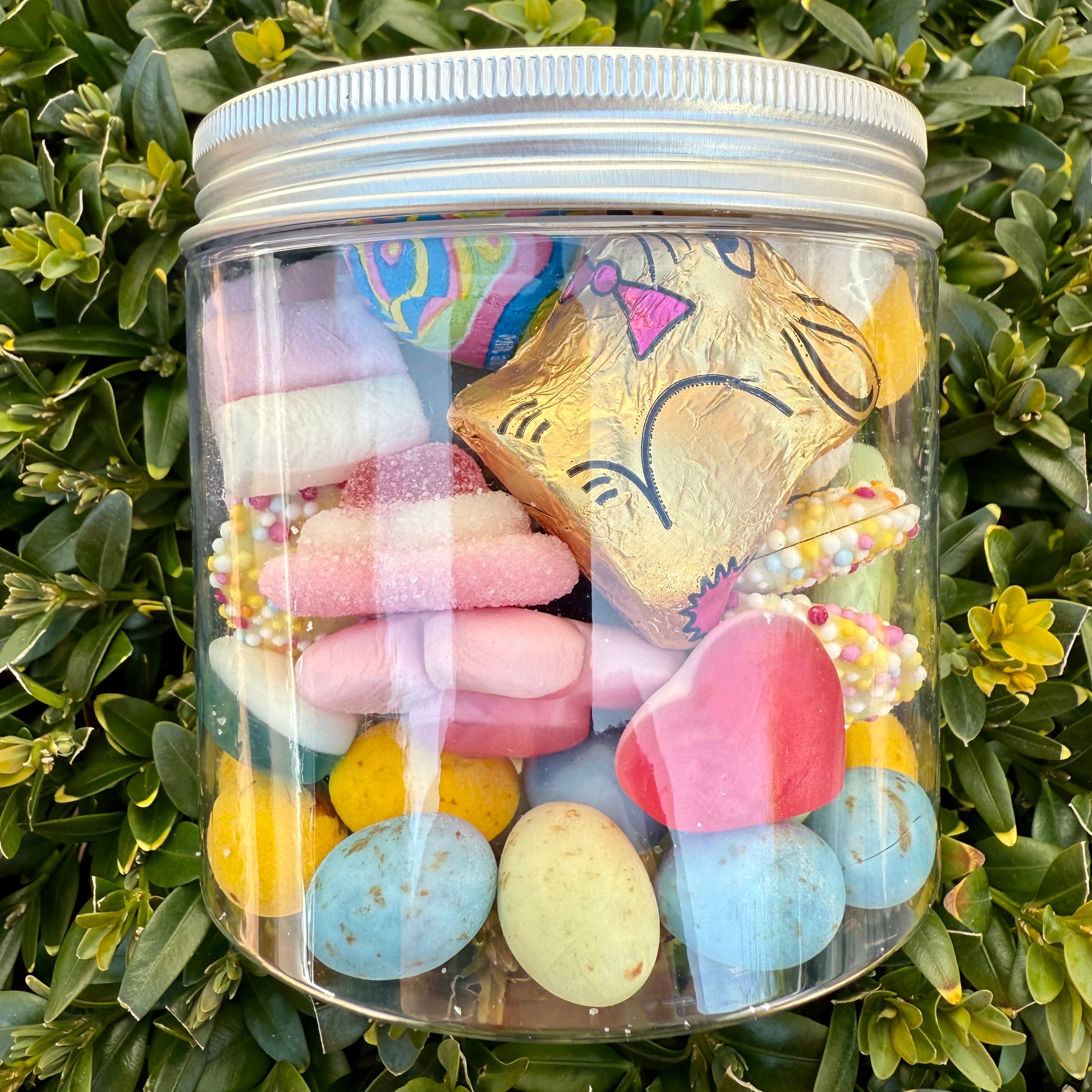 Big Mouth Candy Easter sweet jar filled with pastel chocolate eggs, marshmallows, jelly hearts, fizzy sweets, and a gold chocolate bunny – perfect pick and mix treat jar for spring or Easter gifting