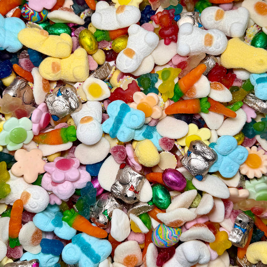 Close up of Big Mouth Candy Easter pick and mix sweets with mini eggs marshmallows and chocolate Easter treats