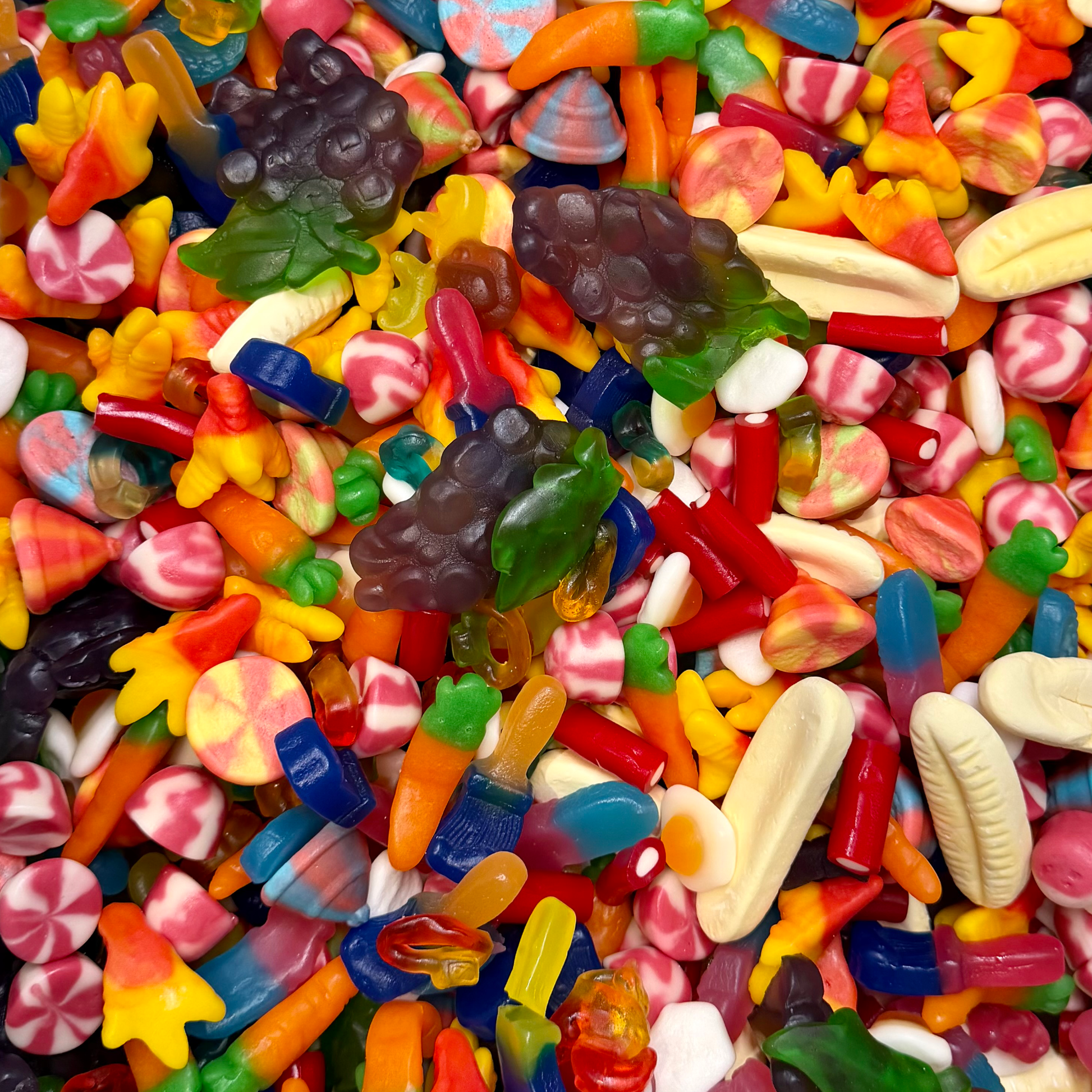 Close up of jelly pick and mix sweets showing soft textures and fruity colours