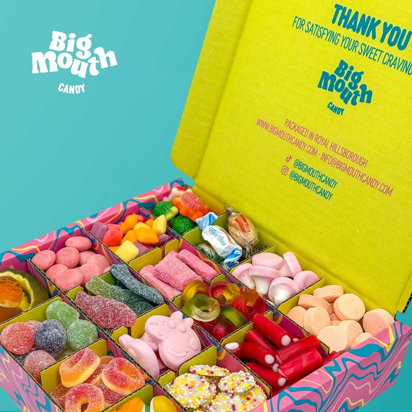 Close-up of Big Mouth Candy pick and mix box (1kg) filled with premium sweets. Sectioned compartments display gummy, fizzy, and chocolate eggs, making it perfect for personalised sweet gifts