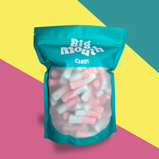 Big Mouth Candy Sour Bottle Edition a front-facing, resealable pick and mix bag filled with chewy, fizzy, and tangy UK sweets in vibrant blue and pink colors. Designed for freshness, this sweet bag is perfect for those who love a sour kick. Available for candy delivery across Northern Ireland and the UK, including Royal Hillsborough. A must-have for sweet lovers