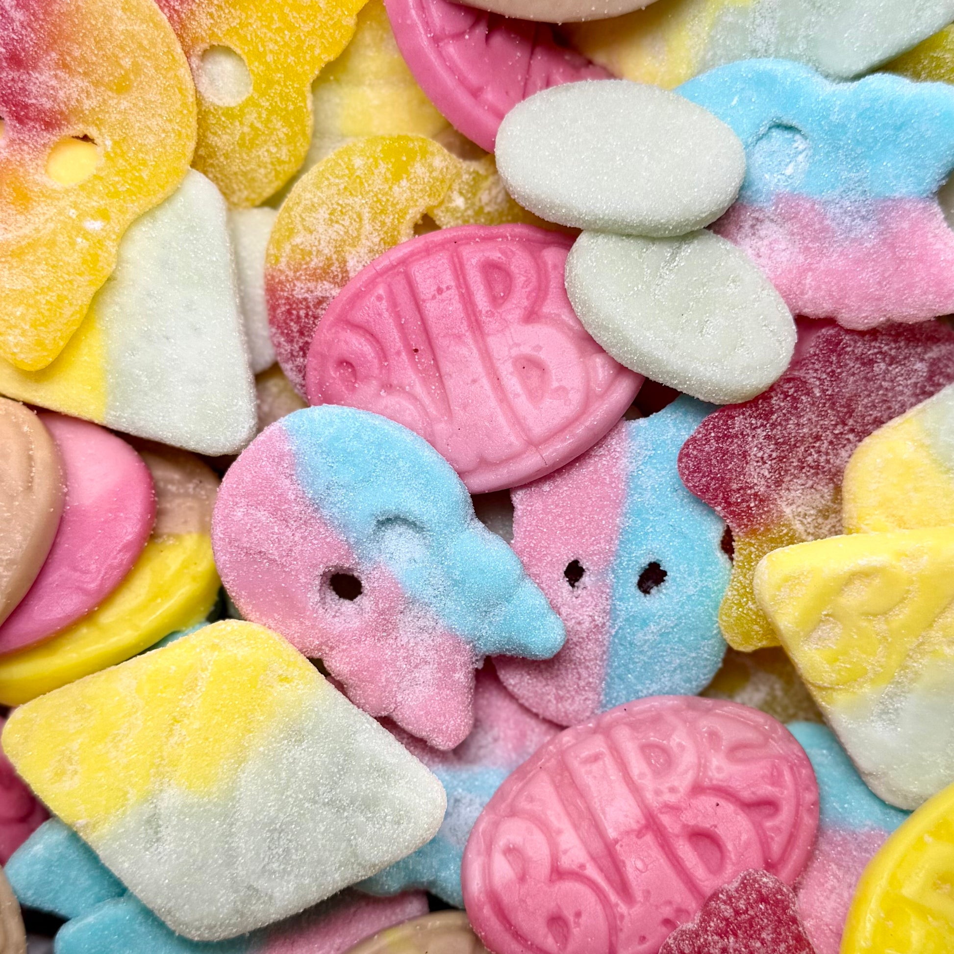 Close up of Big Mouth Candy Bubs Mix sweets including Bubs skulls foam ovals tutti frutti diamonds and banana toffee sweets
