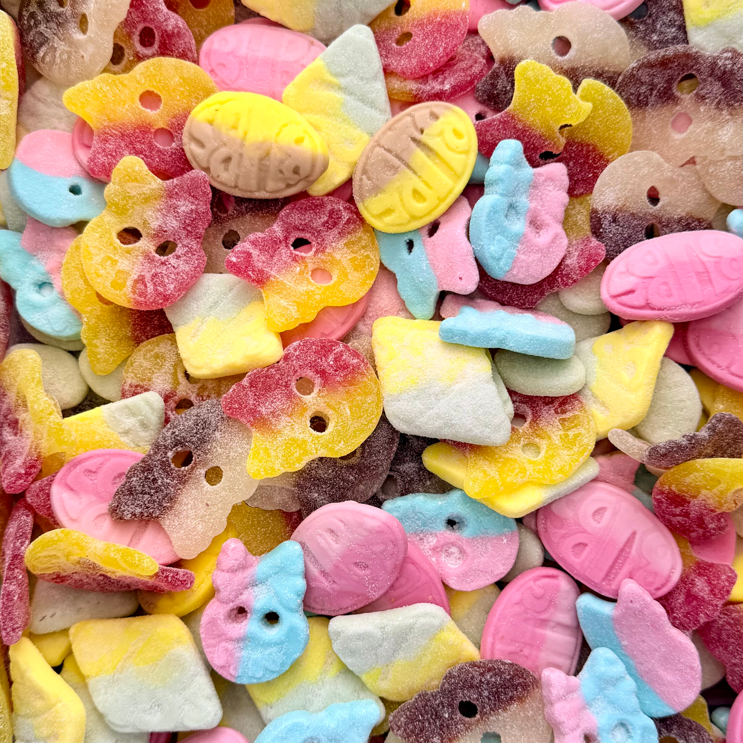 Close up of bubs sweets skulls, ovals, diamond shaped fizzy and foam sweets