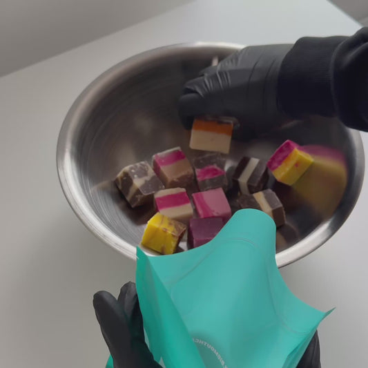 Video of Big Mouth Candy fudge being packed into a resealable 500g pouch vibrant pick and mix sweets shown up close, perfect for sweet bags, candy boxes, and UK sweets delivery. Handmade in Northern Ireland, ideal for sweet lovers and gift boxes